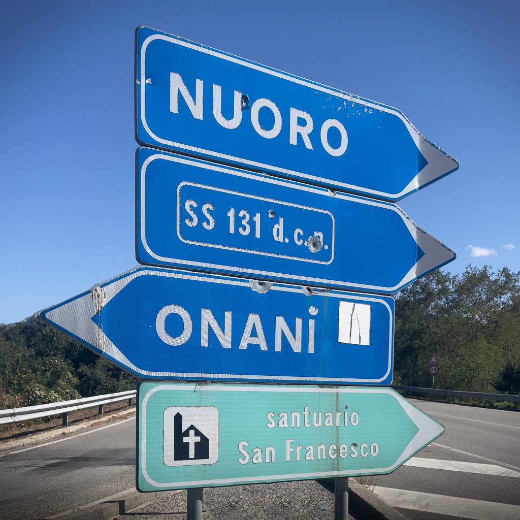 Road signs in the Barbaria region of Sardinia in Italy
